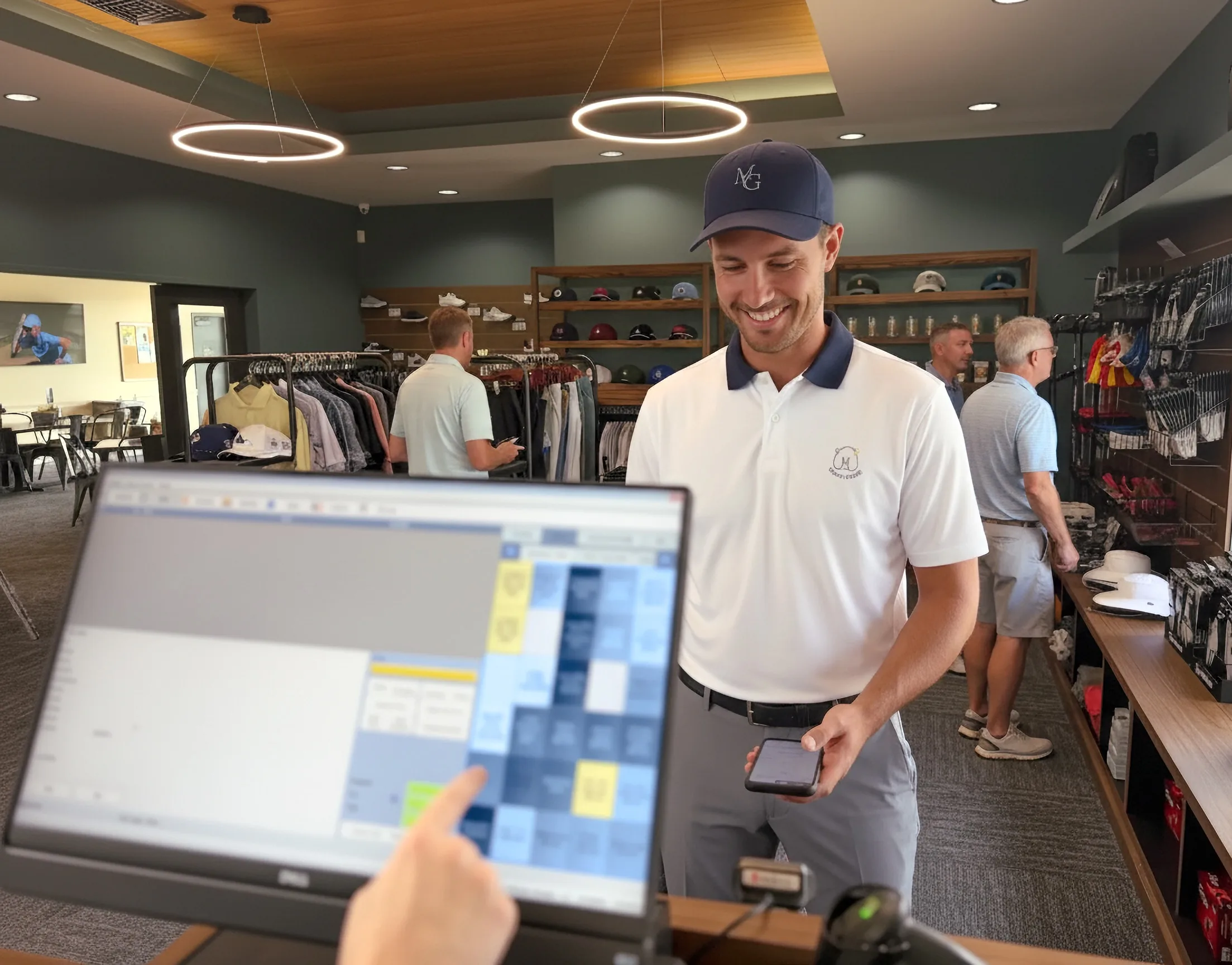 Picture of golf shop with tee quest solutions software being used on a touch screen monitor.